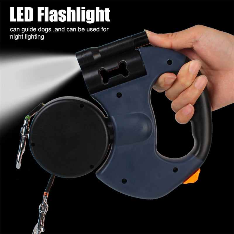 Dual retractable dog leash in use during nighttime walk with built-in LED flashlight